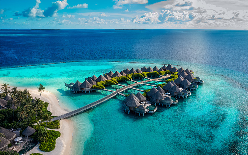 Aerial of the luxurious over water houses and residences at The Nautilus Maldives