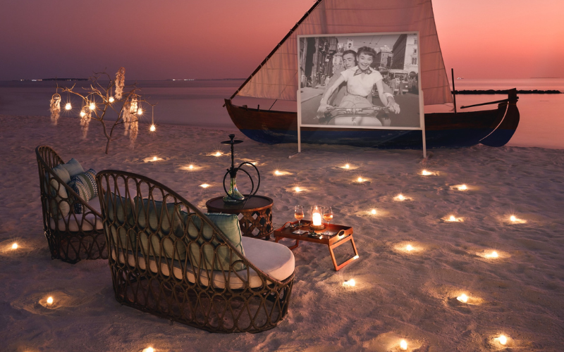 Private movie screening experience at The Nautilus Maldives at sunset