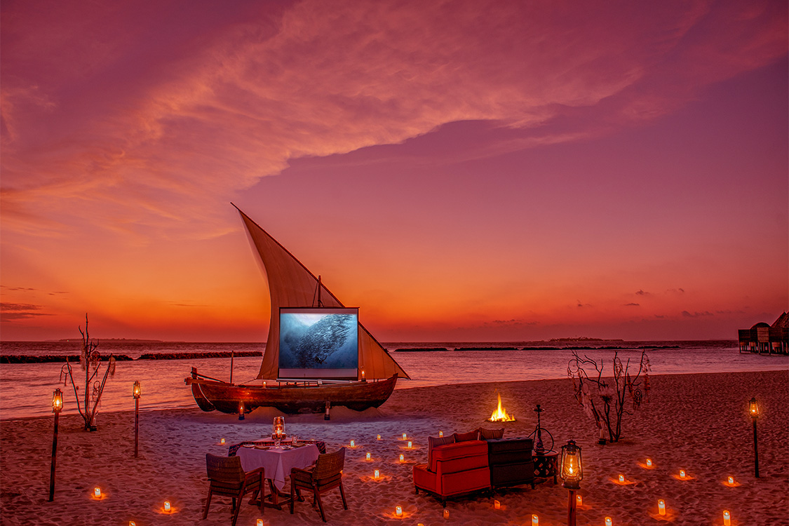 Private movie screening experience at The Nautilus Maldives at sunset