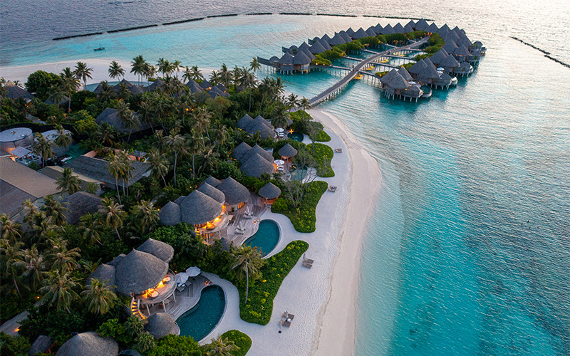 An aerial of the beach houses and ocean houses at The Nautilus Maldives