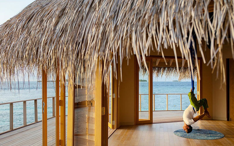 Man Doing Yoga Session at The Nautilus Maldives
