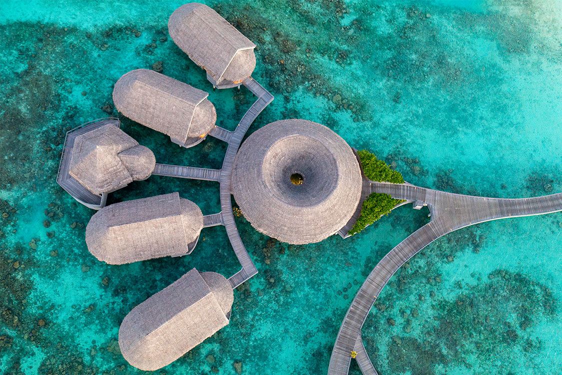 Top down aerial of the luxurious over water spa at The Nautilus Maldives