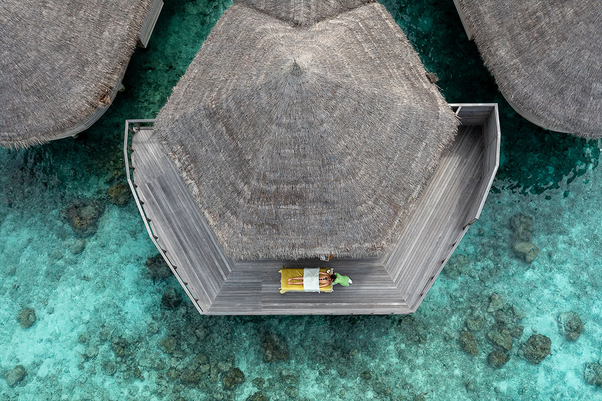 Top down aerial view of a person getting a treatment at the deck of the treatment room at Solasta spa