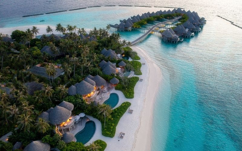 An aerial of the beach houses and ocean houses at The Nautilus Maldives