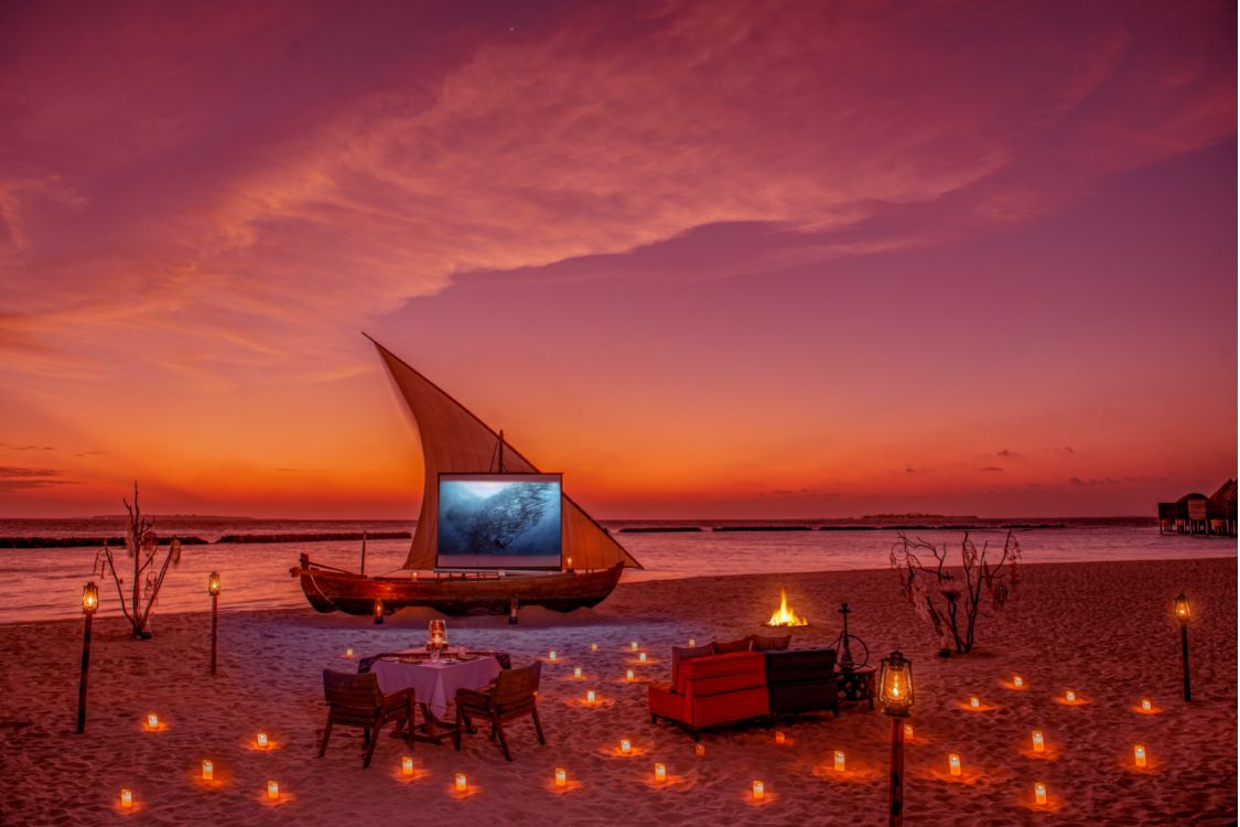 Private movie screening experience at The Nautilus Maldives at sunset