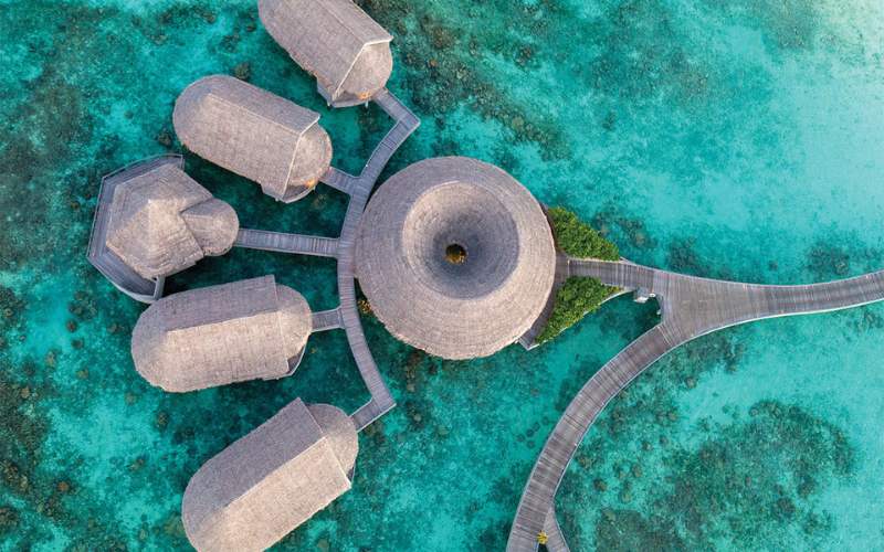 Top down view of the overwater treatment rooms and yoga pavillion at solasta Spa