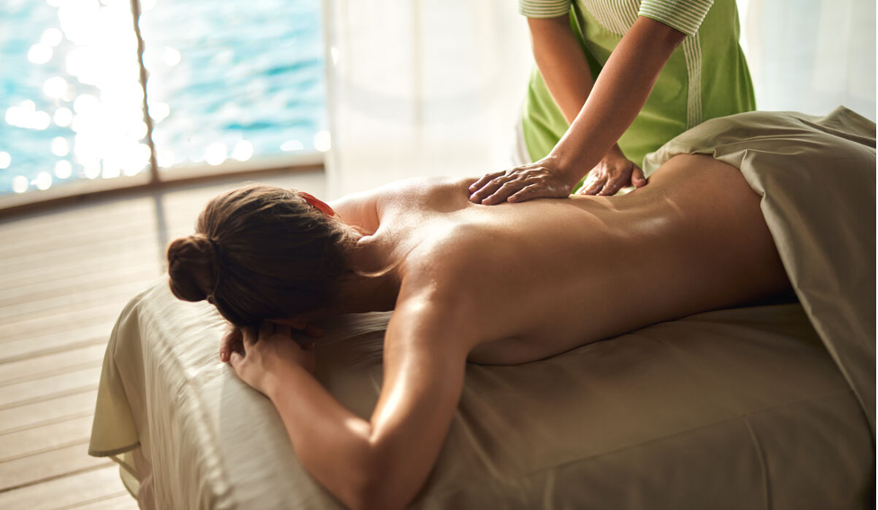 A woman getting a treatment at the Solasta Spa with stunning views of the indian ocean