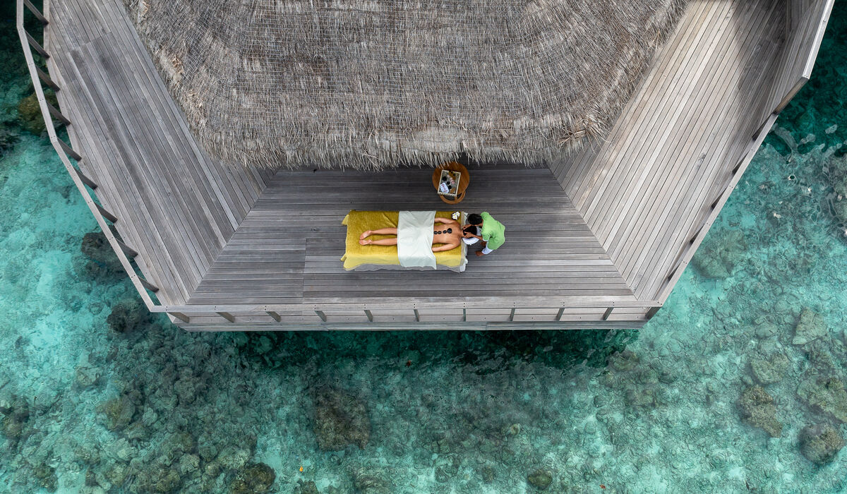 Aerial of a person getting an outdoor massage at Solasta Spa